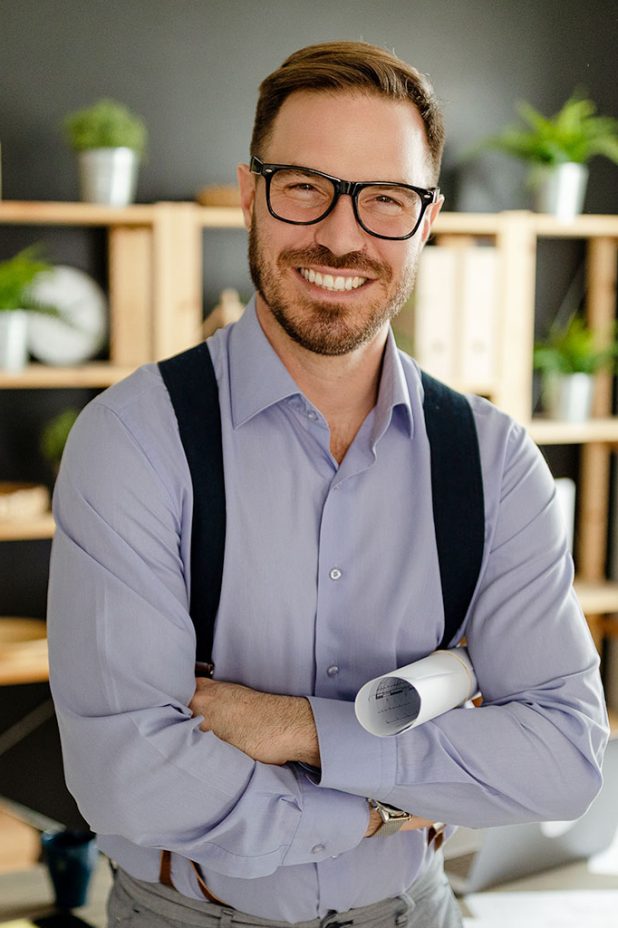 smiling-architect-holding-roll-of-architectural-pr-BRL5ER2.jpg smiling-architect-holding-roll-of-architectural-pr-BRL5ER2.jpg
